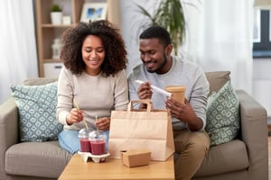 couple eating delivery food