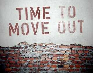 Time_To_Move_Out_Written_On_Broken_Wall