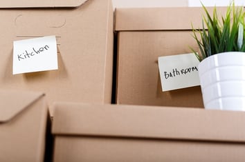 cardboard boxes labeled for moving