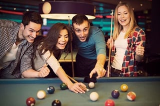 friends playing pool