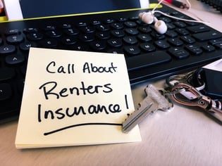 call about renters insurance written on post-it note 